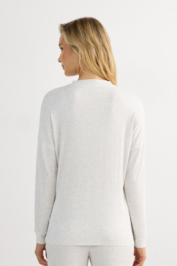 Κομψό και άνετο μπλουζάκι με κουμπιά και μακριά μανίκια από modal Κομψό και άνετο μπλουζάκι με κουμπιά και μακριά μανίκια από modal