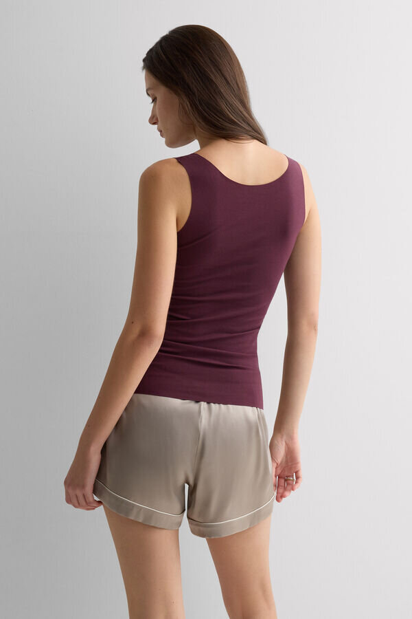 Μπλούζα από βαμβάκι με στρογγυλό λαιμό και ακατέργαστα άκρα Μπλούζα από βαμβάκι με στρογγυλό λαιμό και ακατέργαστα άκρα