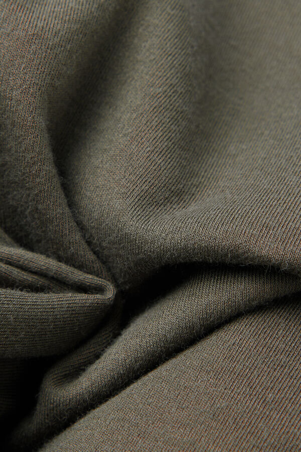 Μπλούζα από βαμβάκι με στρογγυλό λαιμό και ακατέργαστα άκρα Μπλούζα από βαμβάκι με στρογγυλό λαιμό και ακατέργαστα άκρα