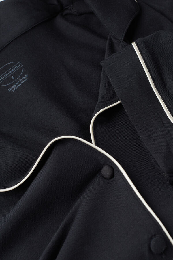 Μπλούζα με κουμπιά και κοντά μανίκια από modal Μπλούζα με κουμπιά και κοντά μανίκια από modal