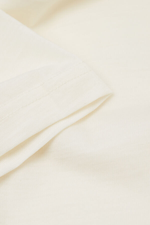 Μπλουζάκι με κοντό μανίκι από ελαστικό μαλλί μερινό Μπλουζάκι με κοντό μανίκι από ελαστικό μαλλί μερινό